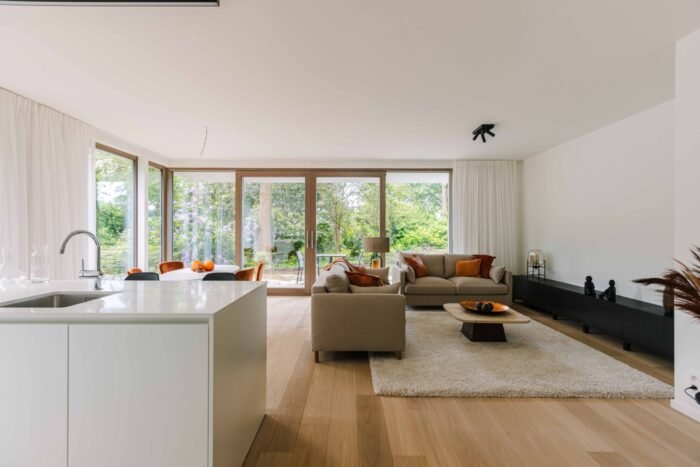 Steelander Projectontwikkeling Residentie Klossebos met moderne appartementen en een groene parktuin in Zwijnaarde Steelander Projectontwikkeling Nieuwbouwappartementen Klossebos Zwijnaarde met parktuin ingericht appartement